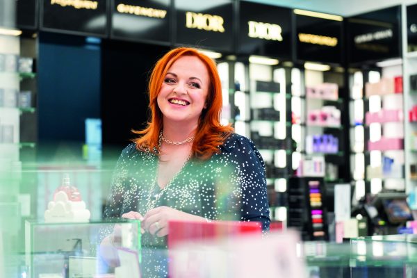 Lady shopping in The Fragrance Shop
